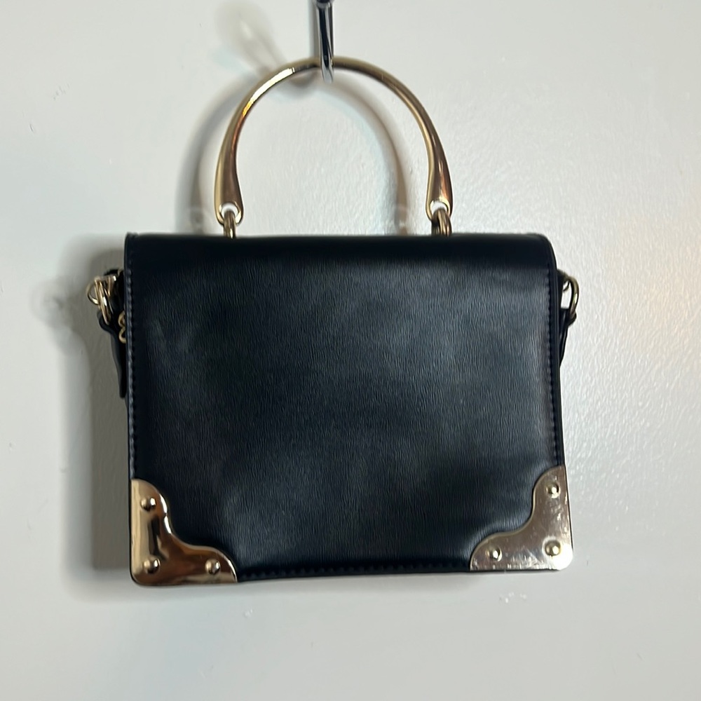 black and gold purse